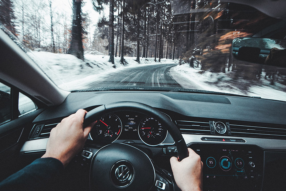 Volkswagon Driving on a snowy road